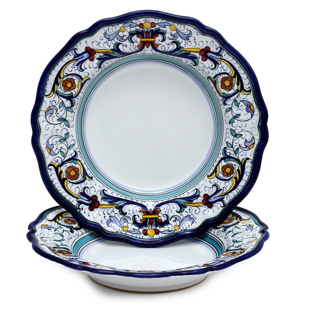 Handcrafted Italian ceramic dinner plates from the Vecchia Deruta collection, featuring intricate blue, yellow, and red floral patterns.